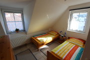 Das Kinderzimmer der linken H&auml;lfte mit Blick auf die Einzelbetten